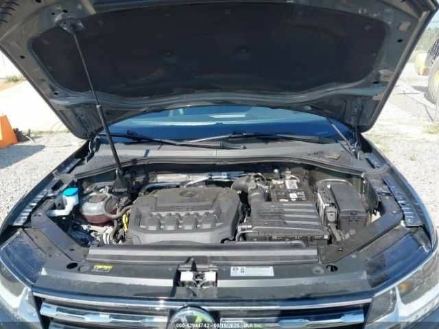 Серый Фольксваген Тигуан, объемом двигателя 2 л и пробегом 42 тыс. км за 5500 $, фото 9 на Automoto.ua