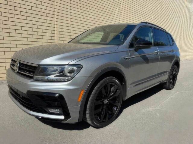 Серый Фольксваген Тигуан, объемом двигателя 2 л и пробегом 40 тыс. км за 10000 $, фото 2 на Automoto.ua