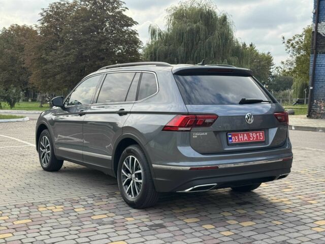 Серый Фольксваген Тигуан, объемом двигателя 2 л и пробегом 107 тыс. км за 19599 $, фото 7 на Automoto.ua