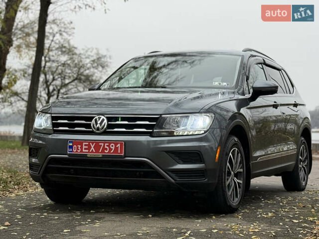 Сірий Фольксваген Тігуан, об'ємом двигуна 2 л та пробігом 212 тис. км за 16900 $, фото 1 на Automoto.ua