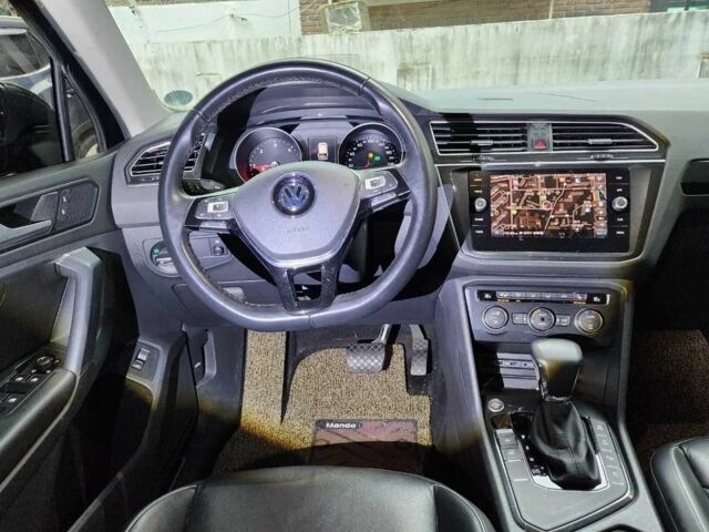 Сірий Фольксваген Тігуан, об'ємом двигуна 2 л та пробігом 69 тис. км за 13991 $, фото 4 на Automoto.ua