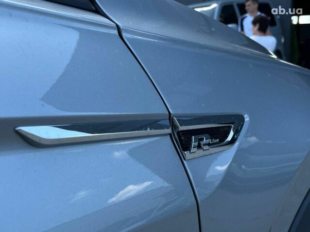 Серый Фольксваген Тигуан, объемом двигателя 2 л и пробегом 135 тыс. км за 23690 $, фото 39 на Automoto.ua