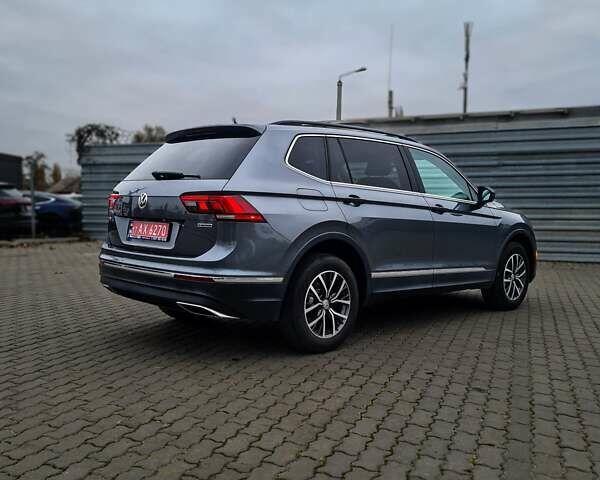 Серый Фольксваген Тигуан, объемом двигателя 2 л и пробегом 122 тыс. км за 20500 $, фото 3 на Automoto.ua