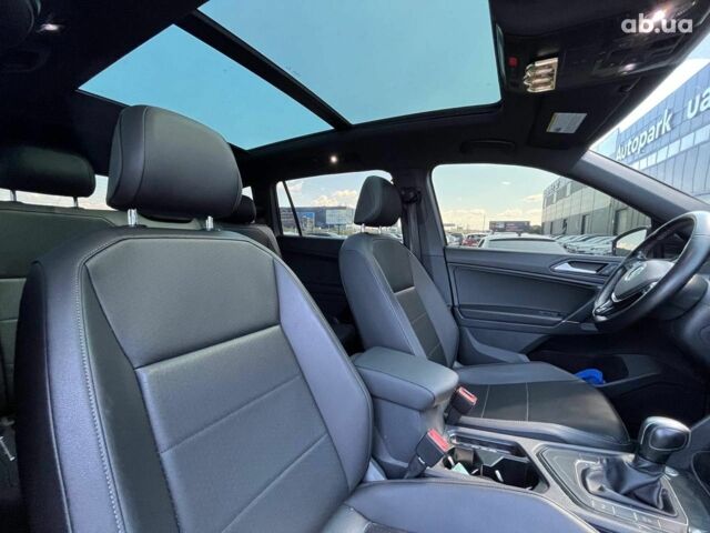 Серый Фольксваген Тигуан, объемом двигателя 2 л и пробегом 135 тыс. км за 23690 $, фото 37 на Automoto.ua