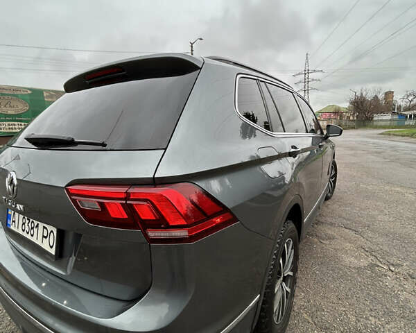 Сірий Фольксваген Тігуан, об'ємом двигуна 1.98 л та пробігом 128 тис. км за 18700 $, фото 5 на Automoto.ua