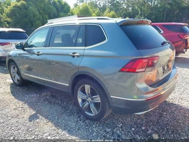 Серый Фольксваген Тигуан, объемом двигателя 2 л и пробегом 42 тыс. км за 5500 $, фото 2 на Automoto.ua