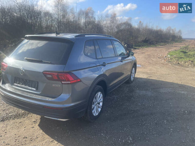 Сірий Фольксваген Тігуан, об'ємом двигуна 2 л та пробігом 104 тис. км за 14200 $, фото 4 на Automoto.ua
