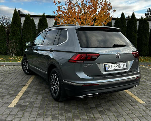 Сірий Фольксваген Тігуан, об'ємом двигуна 2 л та пробігом 98 тис. км за 22300 $, фото 5 на Automoto.ua