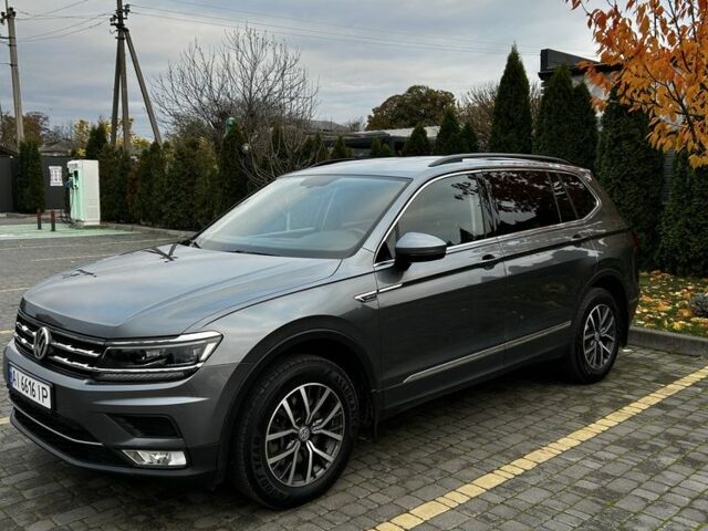 Серый Фольксваген Тигуан, объемом двигателя 2 л и пробегом 98 тыс. км за 22000 $, фото 1 на Automoto.ua