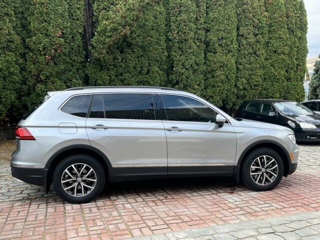 Серый Фольксваген Тигуан, объемом двигателя 2 л и пробегом 225 тыс. км за 18700 $, фото 3 на Automoto.ua