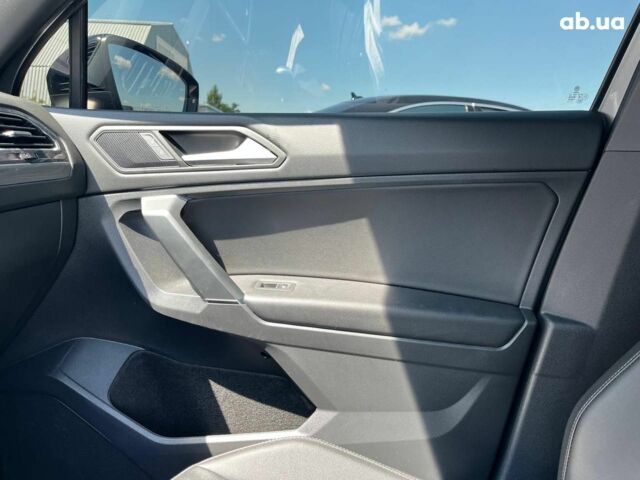 Серый Фольксваген Тигуан, объемом двигателя 2 л и пробегом 135 тыс. км за 23690 $, фото 23 на Automoto.ua