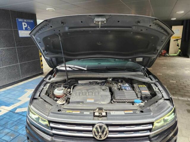 Сірий Фольксваген Тігуан, об'ємом двигуна 2 л та пробігом 69 тис. км за 13991 $, фото 5 на Automoto.ua