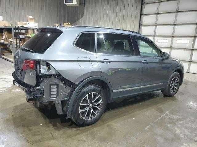 Сірий Фольксваген Тігуан, об'ємом двигуна 2 л та пробігом 78 тис. км за 5000 $, фото 2 на Automoto.ua