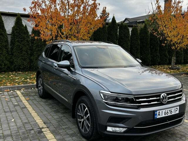 Серый Фольксваген Тигуан, объемом двигателя 2 л и пробегом 98 тыс. км за 22000 $, фото 2 на Automoto.ua