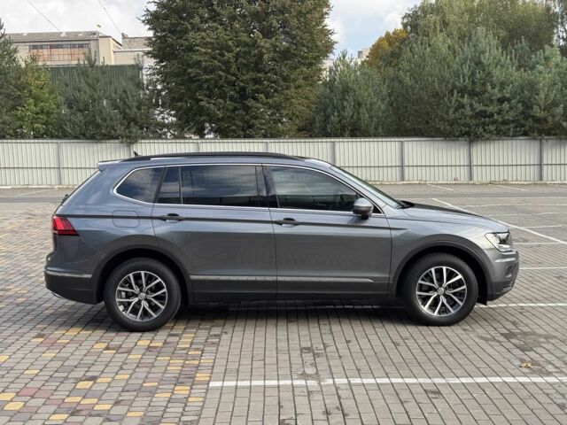 Серый Фольксваген Тигуан, объемом двигателя 2 л и пробегом 107 тыс. км за 19599 $, фото 11 на Automoto.ua