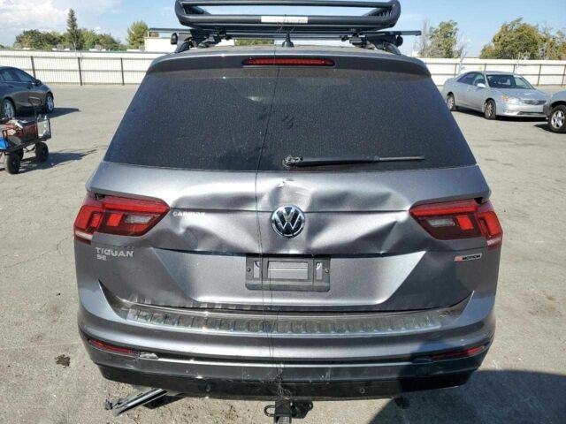 Сірий Фольксваген Тігуан, об'ємом двигуна 2 л та пробігом 58 тис. км за 12800 $, фото 5 на Automoto.ua