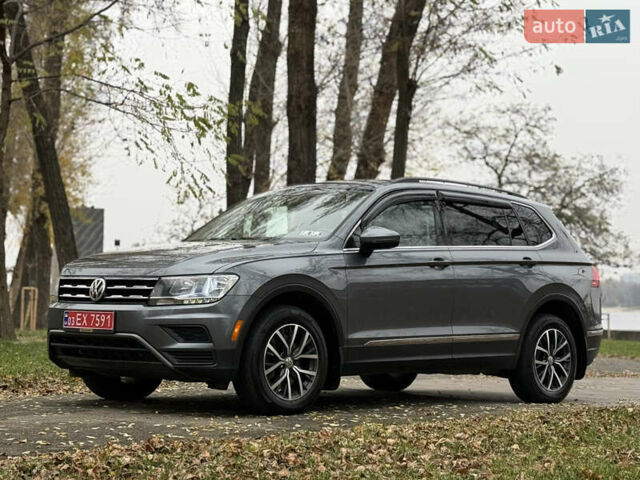 Сірий Фольксваген Тігуан, об'ємом двигуна 2 л та пробігом 212 тис. км за 16900 $, фото 4 на Automoto.ua