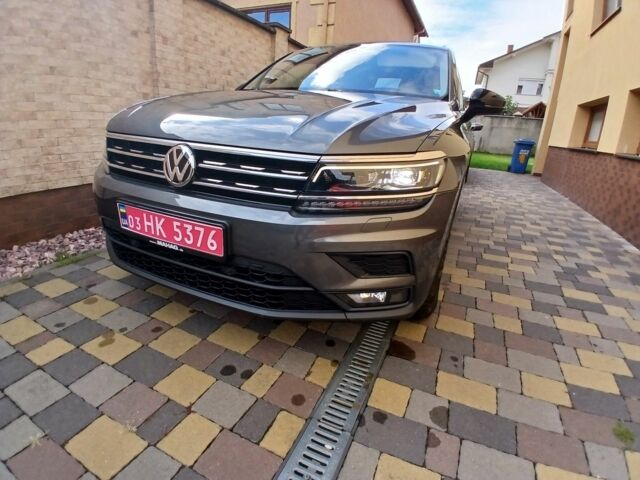 Серый Фольксваген Тигуан, объемом двигателя 2 л и пробегом 150 тыс. км за 26000 $, фото 2 на Automoto.ua