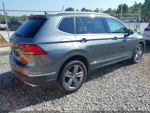 Серый Фольксваген Тигуан, объемом двигателя 2 л и пробегом 42 тыс. км за 5500 $, фото 3 на Automoto.ua