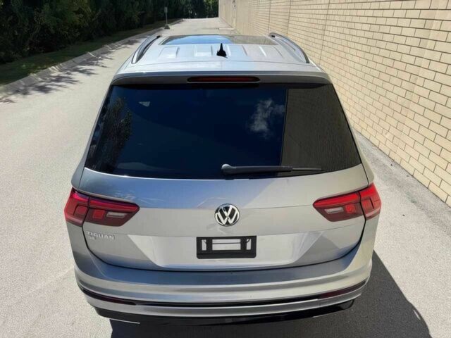 Серый Фольксваген Тигуан, объемом двигателя 2 л и пробегом 40 тыс. км за 10000 $, фото 6 на Automoto.ua