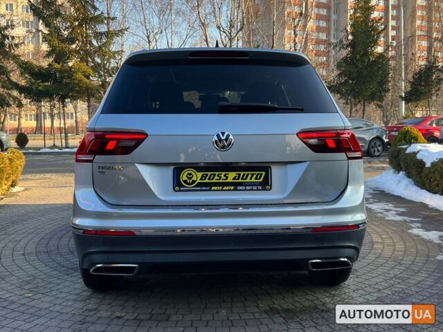 Сірий Фольксваген Тігуан, об'ємом двигуна 2 л та пробігом 56 тис. км за 19800 $, фото 5 на Automoto.ua