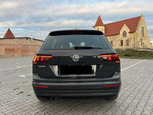 Серый Фольксваген Тигуан, объемом двигателя 2 л и пробегом 212 тыс. км за 15900 $, фото 4 на Automoto.ua