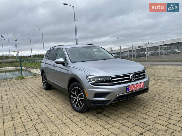 Серый Фольксваген Тигуан, объемом двигателя 2 л и пробегом 148 тыс. км за 19850 $, фото 1 на Automoto.ua