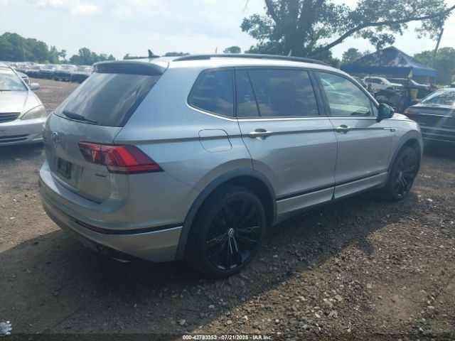 Сірий Фольксваген Тігуан, об'ємом двигуна 2 л та пробігом 32 тис. км за 4500 $, фото 3 на Automoto.ua