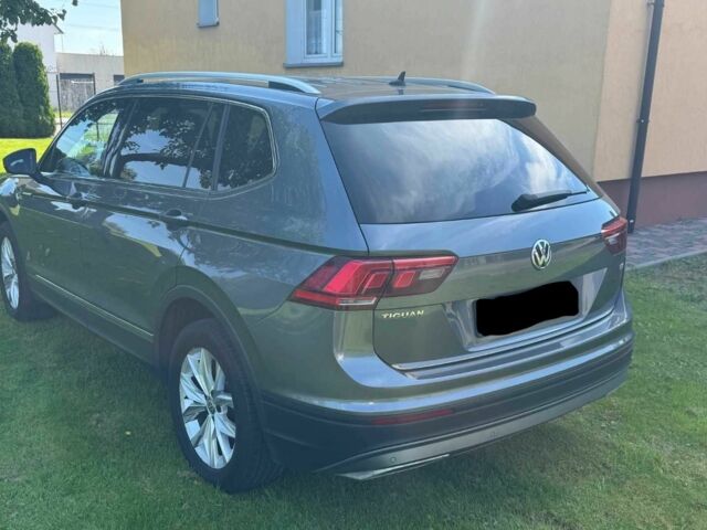 Сірий Фольксваген Тігуан, об'ємом двигуна 2 л та пробігом 35 тис. км за 13100 $, фото 1 на Automoto.ua