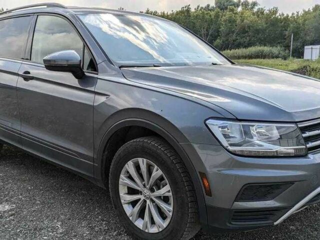 Серый Фольксваген Тигуан, объемом двигателя 2 л и пробегом 98 тыс. км за 9800 $, фото 3 на Automoto.ua