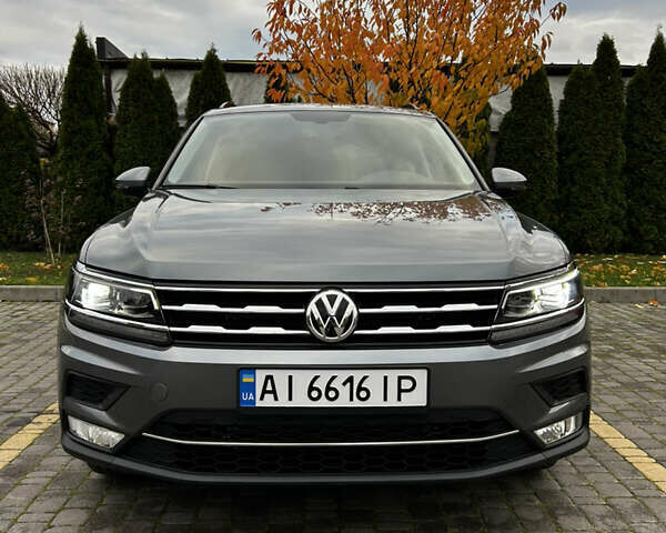 Сірий Фольксваген Тігуан, об'ємом двигуна 2 л та пробігом 98 тис. км за 22300 $, фото 1 на Automoto.ua