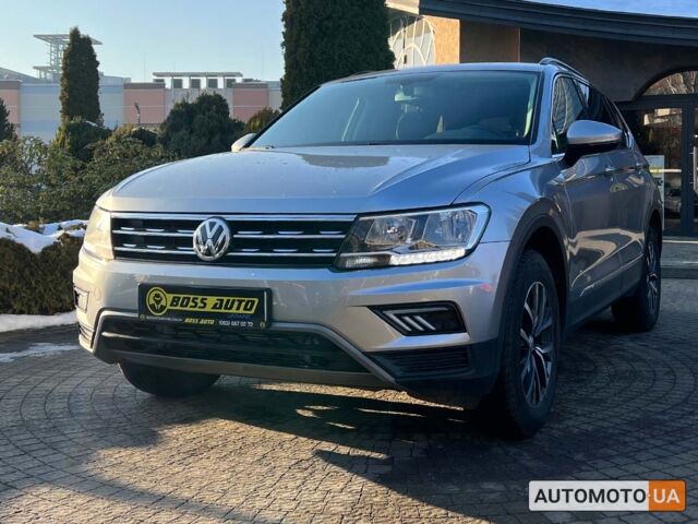 Сірий Фольксваген Тігуан, об'ємом двигуна 2 л та пробігом 56 тис. км за 19800 $, фото 2 на Automoto.ua
