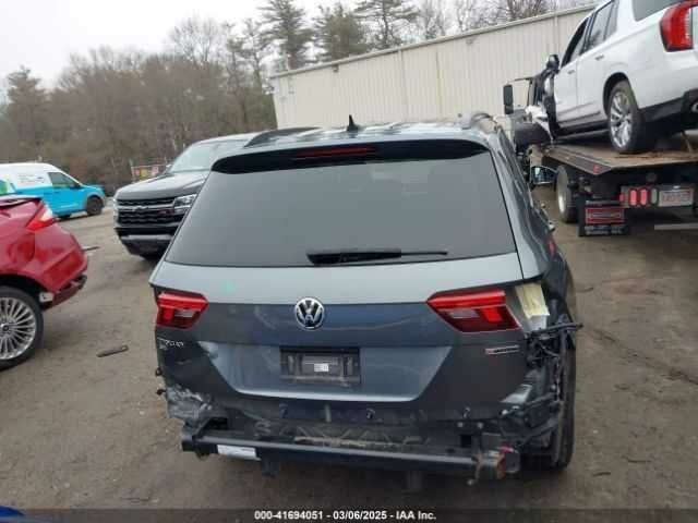 Серый Фольксваген Тигуан, объемом двигателя 2 л и пробегом 59 тыс. км за 4000 $, фото 14 на Automoto.ua