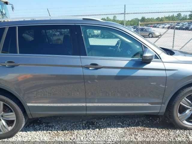 Серый Фольксваген Тигуан, объемом двигателя 2 л и пробегом 42 тыс. км за 5500 $, фото 13 на Automoto.ua