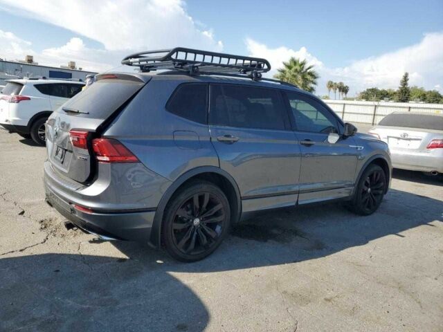 Сірий Фольксваген Тігуан, об'ємом двигуна 2 л та пробігом 36 тис. км за 5300 $, фото 2 на Automoto.ua