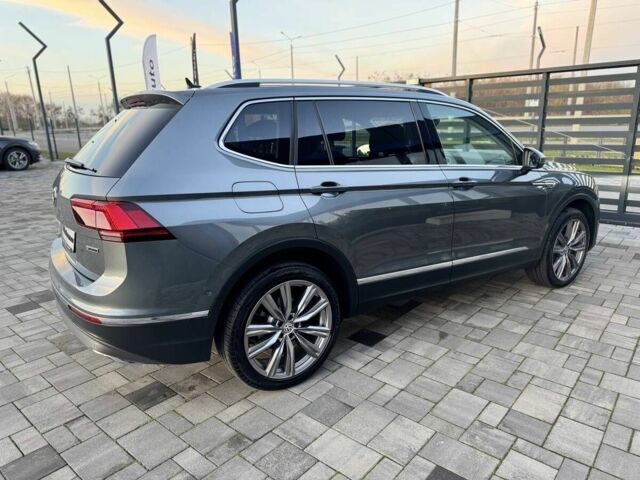 Серый Фольксваген Тигуан, объемом двигателя 2 л и пробегом 172 тыс. км за 33700 $, фото 2 на Automoto.ua