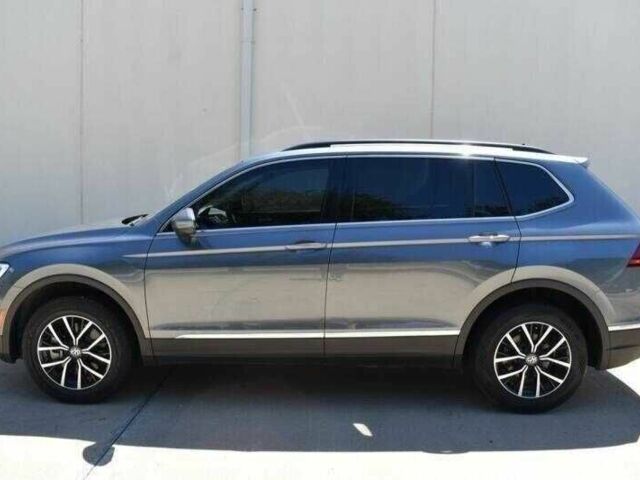 Серый Фольксваген Тигуан, объемом двигателя 2 л и пробегом 45 тыс. км за 9000 $, фото 3 на Automoto.ua