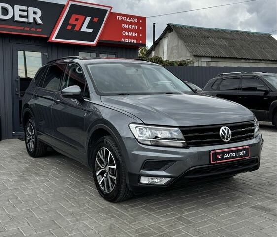 Сірий Фольксваген Тігуан, об'ємом двигуна 2 л та пробігом 97 тис. км за 19900 $, фото 1 на Automoto.ua