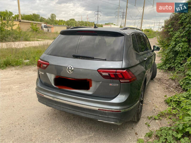 Серый Фольксваген Тигуан, объемом двигателя 1.98 л и пробегом 112 тыс. км за 20500 $, фото 2 на Automoto.ua