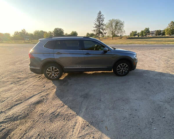 Серый Фольксваген Тигуан, объемом двигателя 1.98 л и пробегом 119 тыс. км за 21500 $, фото 6 на Automoto.ua