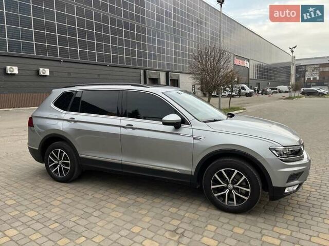 Серый Фольксваген Тигуан, объемом двигателя 2 л и пробегом 119 тыс. км за 19500 $, фото 19 на Automoto.ua