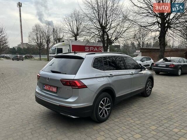 Серый Фольксваген Тигуан, объемом двигателя 2 л и пробегом 119 тыс. км за 19500 $, фото 2 на Automoto.ua