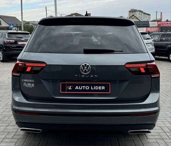 Сірий Фольксваген Тігуан, об'ємом двигуна 2 л та пробігом 97 тис. км за 19900 $, фото 4 на Automoto.ua