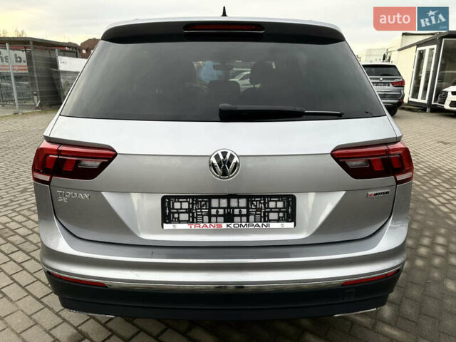 Серый Фольксваген Тигуан, объемом двигателя 2 л и пробегом 124 тыс. км за 16999 $, фото 2 на Automoto.ua