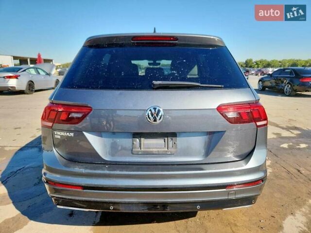 Серый Фольксваген Тигуан, объемом двигателя 1.98 л и пробегом 153 тыс. км за 5500 $, фото 5 на Automoto.ua