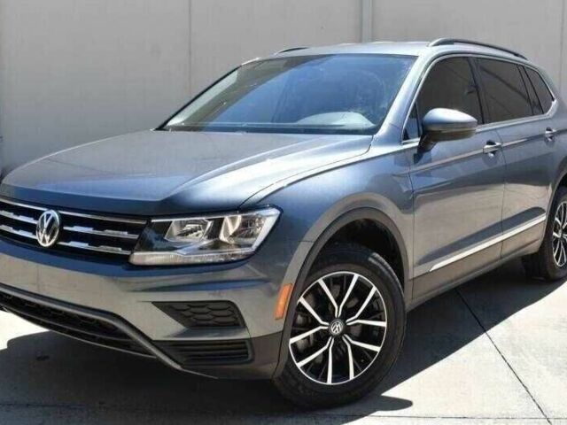 Серый Фольксваген Тигуан, объемом двигателя 2 л и пробегом 45 тыс. км за 9000 $, фото 2 на Automoto.ua