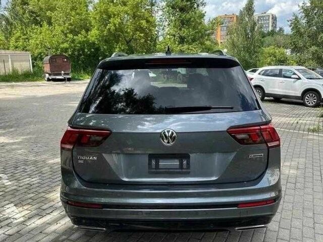 Серый Фольксваген Тигуан, объемом двигателя 2 л и пробегом 83 тыс. км за 15000 $, фото 4 на Automoto.ua