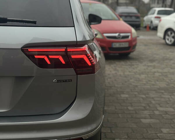 Сірий Фольксваген Тігуан, об'ємом двигуна 2 л та пробігом 204 тис. км за 34499 $, фото 2 на Automoto.ua