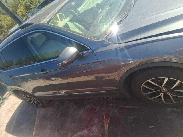 Серый Фольксваген Тигуан, объемом двигателя 2 л и пробегом 56 тыс. км за 12500 $, фото 4 на Automoto.ua