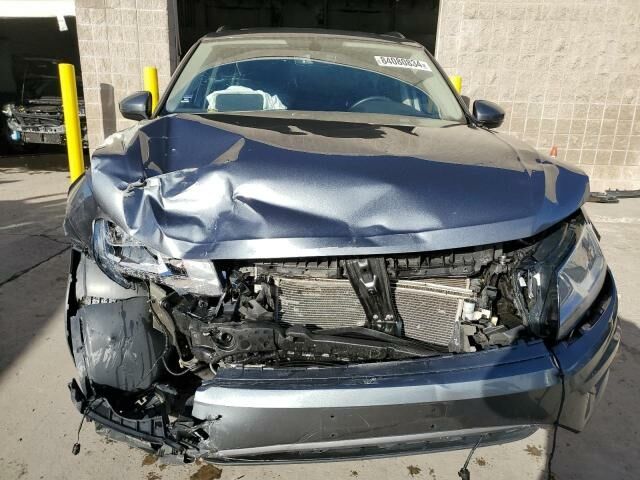 Серый Фольксваген Тигуан, объемом двигателя 2 л и пробегом 124 тыс. км за 11300 $, фото 1 на Automoto.ua